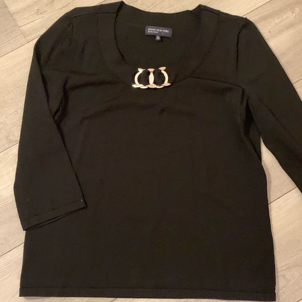 Black top with silver neck decoration